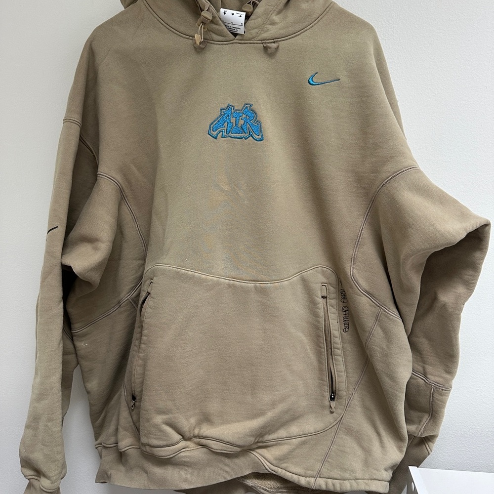 Nike x Off-White™
Men's Fleece Hoodie
Tan, Size Large